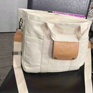 Stylish Cream Canvas Bag with Tan Accents